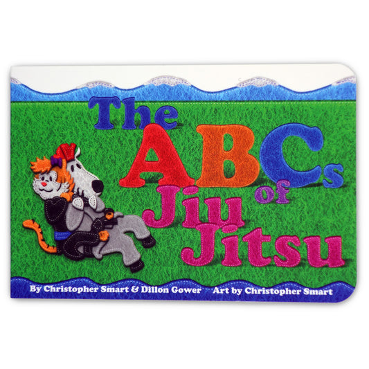 The ABCs of Jiu Jitsu Childrens Book by Retro Grappler features colorful letters on green grass as a cat and dog demonstrate a martial arts move in this playful introduction to Jiu Jitsu for kids.