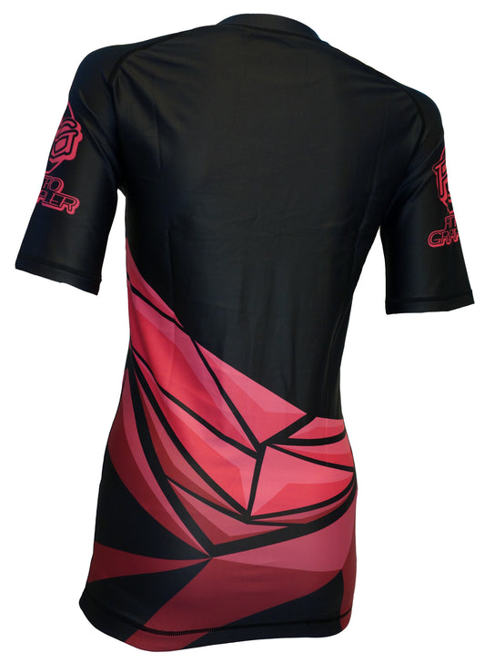 The Retro Grappler Night Breaks BJJ Rash Guard is a short-sleeved black rash guard with a comfortable fit, featuring abstract red geometric patterns on the back and sleeves plus red logos on each sleeve.