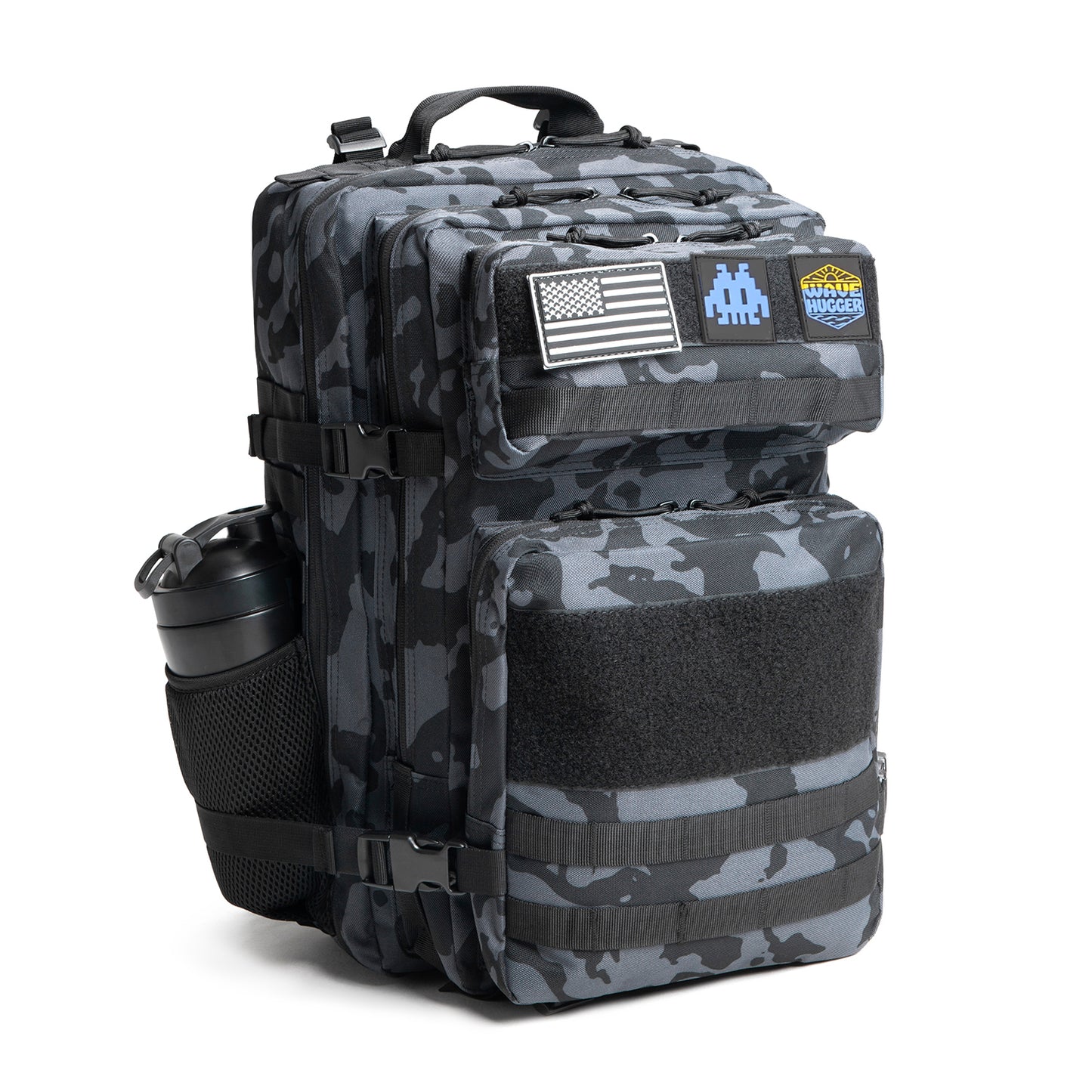 Camouflage backpack with American flag patch and visible branding on a white background