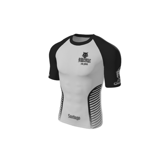 The Custom Retro Grappler Custom Sides Short Sleeve Rash Guard features black sleeves, a white torso, “Santiago” and “Holman Jiu Jitsu” text, black side stripes, and stylized logos—a perfect retro look for grapplers.